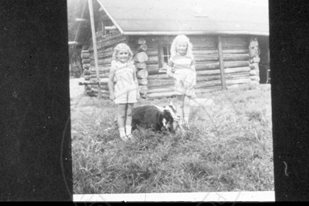 Peggy and Eileen Mullen in front of Alex Bodnar's cabin, Soldotna 1951