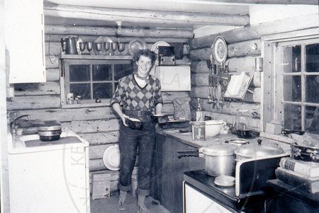 Rusty Lancashire in her cabin kitchen, Soldotna 1956