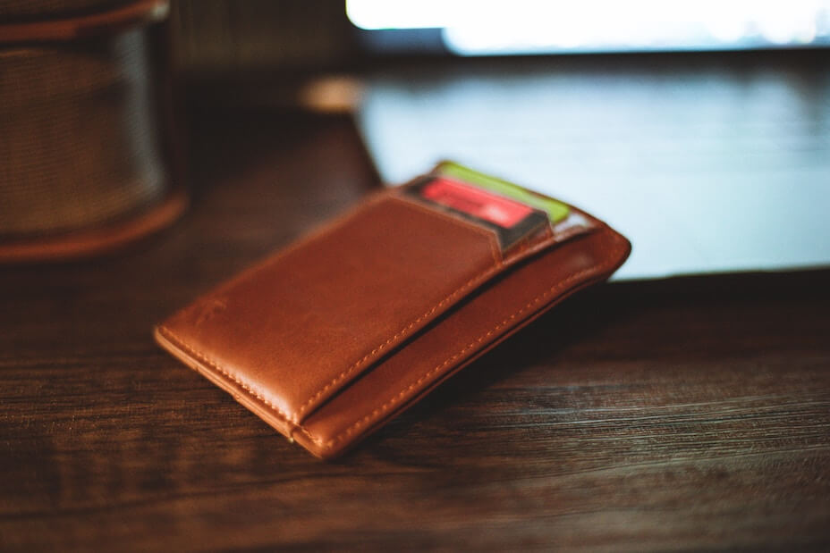 Leather wallet on table