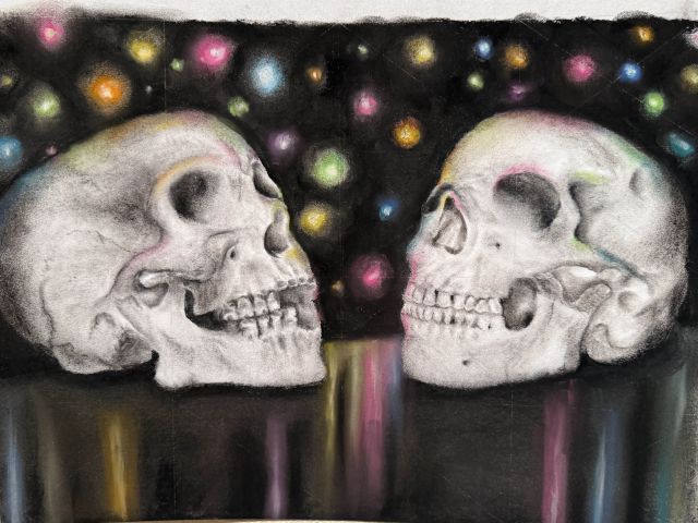 a drawing of two black and white skulls on a black background with colorful lights