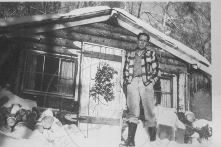 Jack Farnsworth and Farnsworth cabin, Soldotna 1948