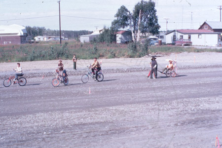 Kids biking in Progress Days Parade, Soldotna 1965