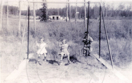Children at play in Farnsworth yard, Soldotna early 1960's