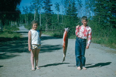 Mary and Francis Mullen with salmon, Soldotna 1960