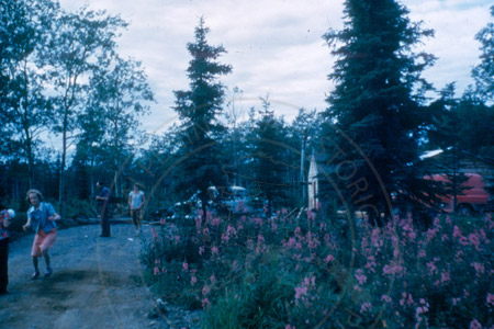 Stock family home, with Carol, Jake and Corrine Dubendorf and Jeannie Stock, Soldotna 1953