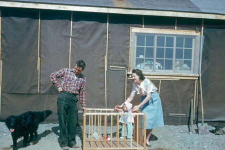 Ruth & Hedley Parsons with daughter and home, Soldotna 1953