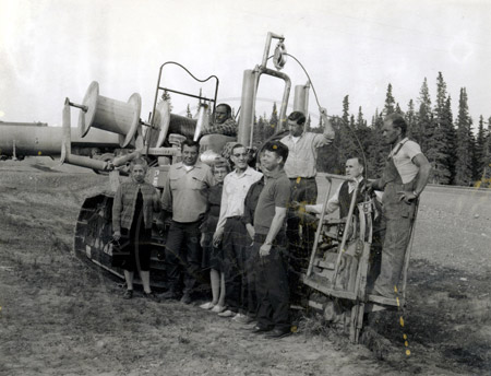 Lola Harberger and Harold Pomeroy with line burying equipment, Soldotna early 1960's