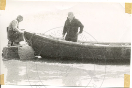 Setnetters in skiff at east side beach of Cook Inlet, Kenai 1961