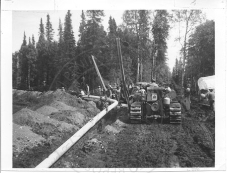 Anchorage Natural Gas Corporation installing pipeline from the Kenai Peninsula to Anchorage, 1960