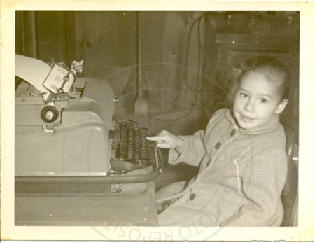 Susan Rorrison with typewriter, Soldotna 1960's