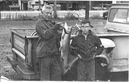 Ed Kimbrall and his son Edward displaying salmon catch, Soldotna 1960