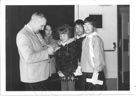Students Pettie Shelman, Linda Staley, and Weaver twins Karen and Sharon receiving an award from Ralph Van Nortwick at an unknown event, Soldotna 1967