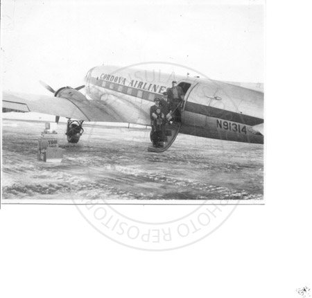 Cordova Airlines Douglas DC 3 airplane and crew, Soldotna 1964