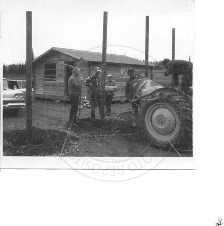 Corky Fuller, Bon Wilson, Roy Johnson, Harry Reger and Ham Hamilton building he Civilian Air Patrol hangar, Soldotna Airport, late 1960's