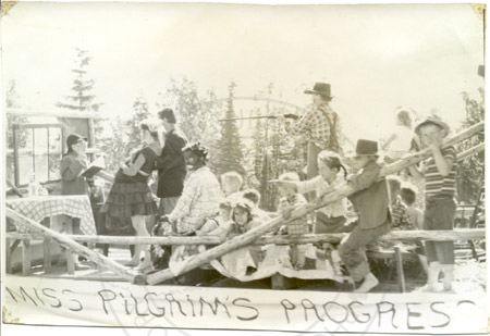 Shotgun wedding "Miss Pilgrim's Progress" float at the Progress Days parade, Soldotna early 1960's
