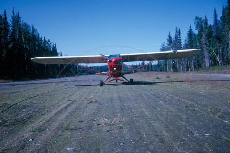 Virgil Dahler's landing strip and plane, Sterling 1964