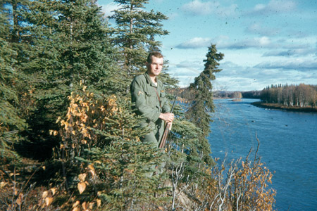 Wildwood serviceman Dave Remley hiking the Kenai River, 1955