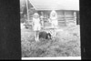 Peggy and Eileen Mullen in front of Alex Bodnar's cabin, Soldotna 1951