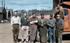 Russ Bagley, Dale Doner, Dale Rorrison, Paul Tachick, Bill Stock, Jake Dubendorf and Marion Hergatt at the Alaska Road Commission Shop, Kenai 1953