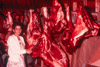 Betty Karsten cutting moose meat in garage, Soldotna 1950's