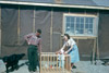 Ruth & Hedley Parsons with daughter and home, Soldotna 1953