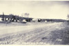 Sterling Highway near Kenai River Bridge with a view of Davenports bar and café, Soldotna 1955