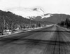 A straight stretch of the Seward Highway through the Kenai Mountains, 1950's-1960's