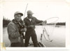 Loren Stewart dip netting for salmon, Kenai River 1960