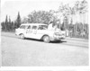 Susie Parker riding on a station wagon during the Progress Days parade, Soldotna early 1960's