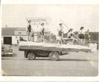 Amber Burton and Velma McFarland on the Nestor Concrete Products float at Soldotna Progress Days parade, Soldotna 1961
