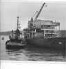 The Hercules Seattle tugboat towing a barge, Nikiski 1962