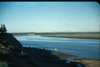Kenai River mouth with Kenai Mountains in background and Northwest Cannery in view, Kenai mid 1950's