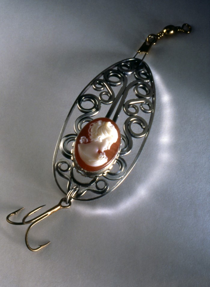 Handmade intricate lure with metal spirals and cameo